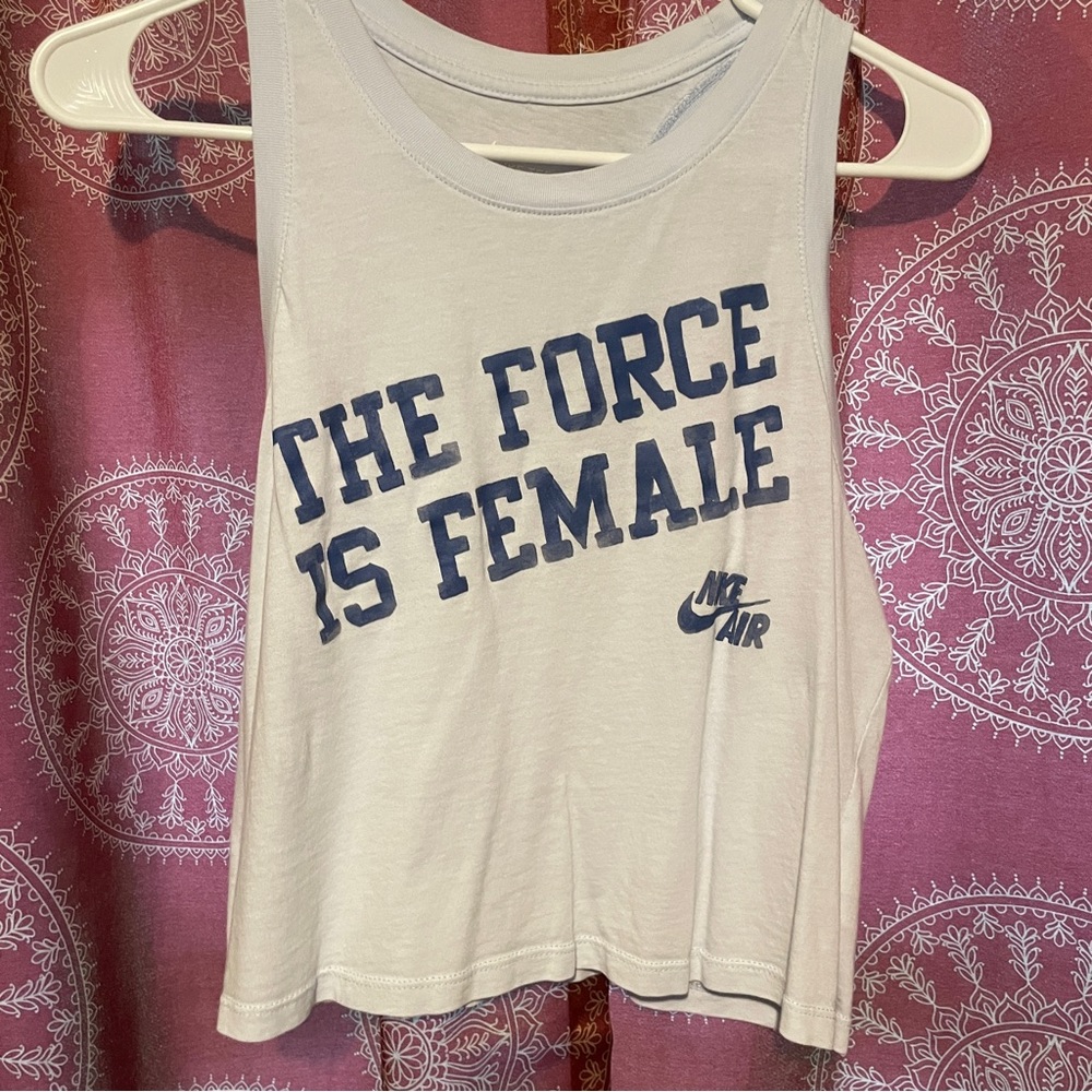 Light blue cropped Nike tank top